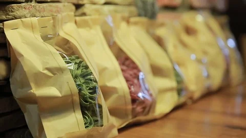 Diferent types of pasta in packages. Close up Stock Footage 72755311