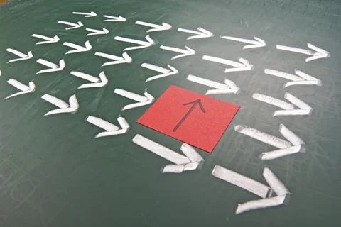 Difference innovation concept. One different direction in the arrow group. 写真素材