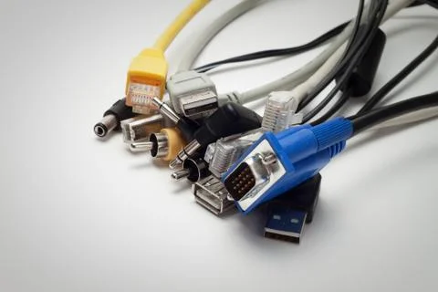 Differenr cables over grey background Stock Photos