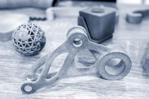 Different Abstract objects printed on powder 3D printer. Multi Jet Fusion MJF. Stock Photos