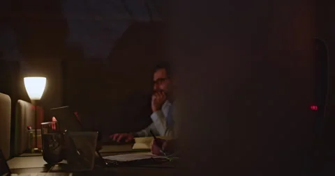 Different aged group of coworkers engaged in a project discussion at a startup Stock Footage 274171869