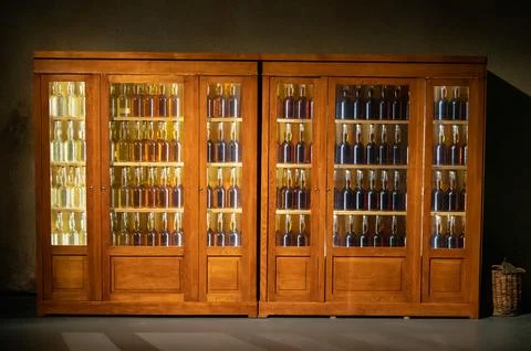 Different ages and colours of strong alcoholic apple drink calvados in Norman Stock Photos