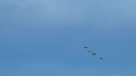 Different aircraft flying in a clear blue sky in formation 2 Video stock 110795249