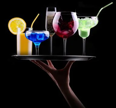 Different alcohol drinks set on a tray Stock Photos