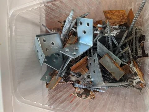 Different and old construction fasteners and small parts Stock Photos