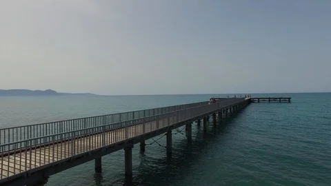 Different angles from above of lagoon beach and wooden pier Stock Footage 88164683
