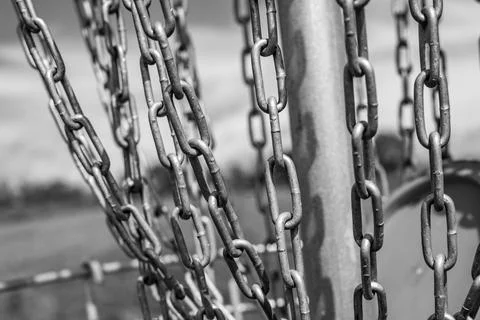 Different angles of view of a disc golf basket and chains Stock Photos