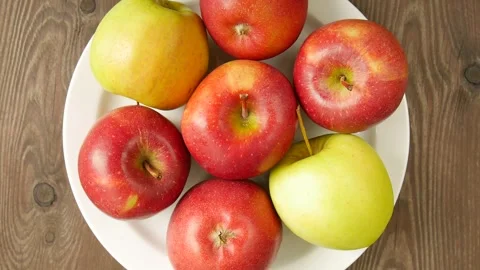 Different apples on a plate. 스톡 동영상 297006542