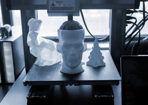 Different art models printed on a 3D printer. Models of a prototype human head Stock Photos