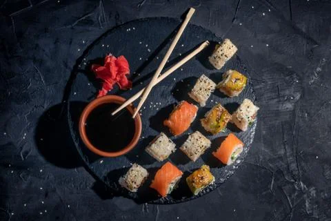 A different assortment of sushi rolls Stock Photos