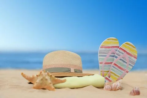 Different beach objects on sand near sea Stock Photos