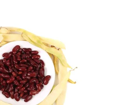  Different beans on a plate. Different beans on a plate. Isolated on a whi... Stock Photos