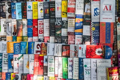 Different books displayed on a table or a shelf at a bookstore in Mumbai Indi Stock Photos