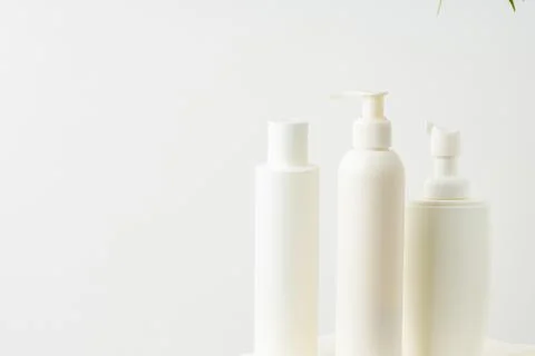 Different bottle shapes on a white background for skincare products display Stock Photos