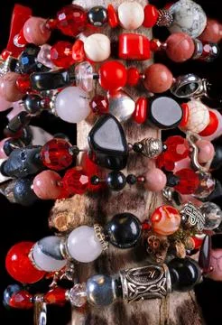 Different   bracelets with black and red  semipreciouse stones with natural.. Foto stock