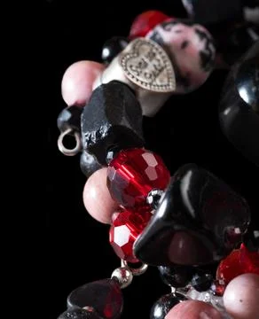 Different   bracelets with black and red  semipreciouse stones with natural.. Stock Photos