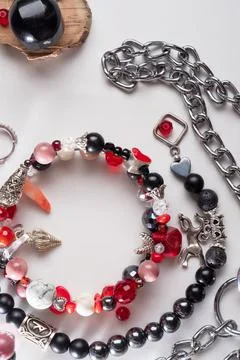 Different   bracelets with black and red  semipreciouse stones with natural.. Stock Photos