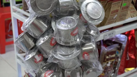 Different brands and types of coffee on the shelf of the Vietnamese supermark Stock Footage 106387584