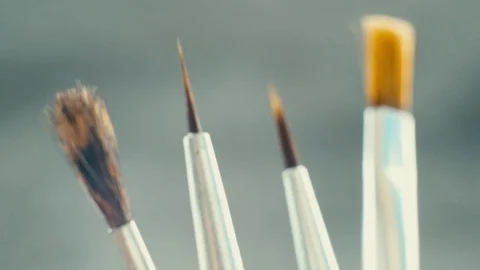 Different brushes for drawing on grey background. Stock Footage 103450994