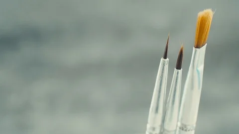 Different brushes for drawing on grey background. Stock Footage 103451020