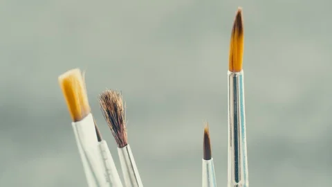 Different brushes for drawing on grey background. Stock Footage 103451063