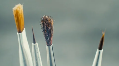 Different brushes for drawing on grey background. Stock Footage 103451098