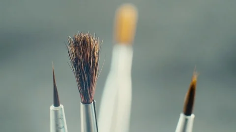 Different brushes for drawing on grey background. Stock Footage 103451180