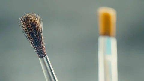Different brushes for drawing on grey background. Stock Footage 103451225