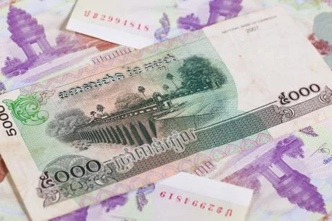 Different cambodia riels banknotes on the table Photos
