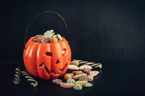 Different candy in bucket Stock Photos