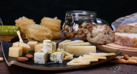 Different cheese and bread Stock Photos