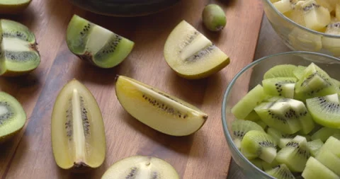 Different chopped kiwi fruit types. 스톡 동영상 331280225