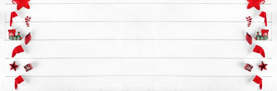 Different christmas objects lay out on white wooden background. Long banner 스톡 사진
