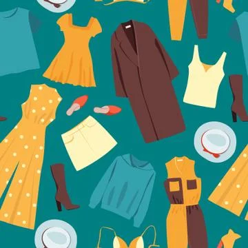 Different clothes on a green background. Seamless pattern. Illustrazione stock