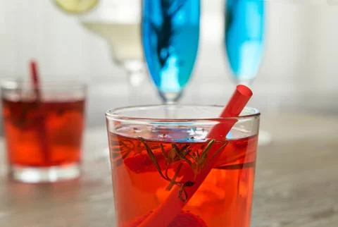Different cocktails in front of window Stock Photos
