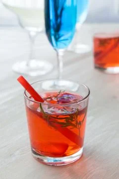 Different cocktails in front of window Stock Photos