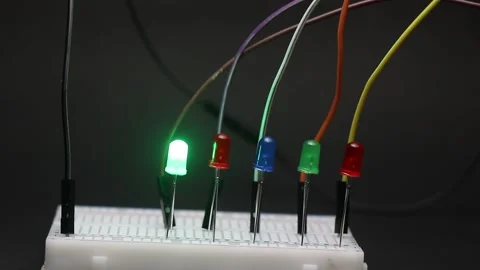 Different color led lights blink in an order imitates the digital thinking Stock Footage 327978352