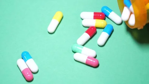 Different color pill capsules and drugs for medicine Vídeo Stock 277369366