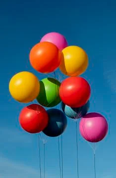 Different colored balloons in the sky Stock Photos