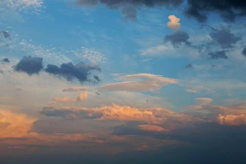 Different colored dramatic sky and clouds Stock Photos