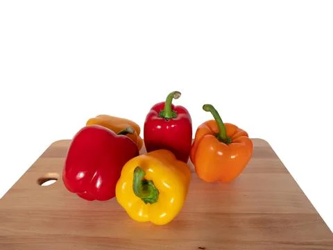 Different colored pepper on a white background Stock Photos