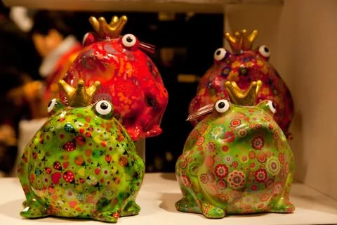 Different colored porcelain frog Stock Photos