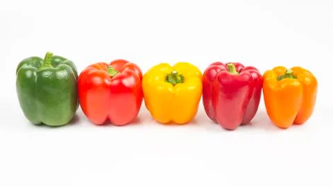 Different colored sweet and bitter peppers on a white background. vitamin foo Stock Photos
