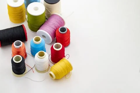 Different colored yarn on white background. Writing area Foto stock