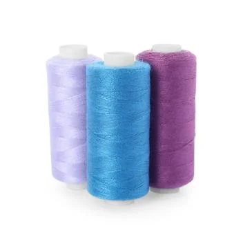 Different colorful sewing threads on white background Stock Photos