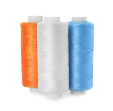 Different colorful sewing threads on white background Stock Photos