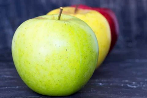 Different colors apples Stock Photos