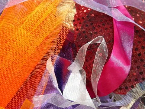 Different coloured textures and types of textiles 80s retro Stock Photos
