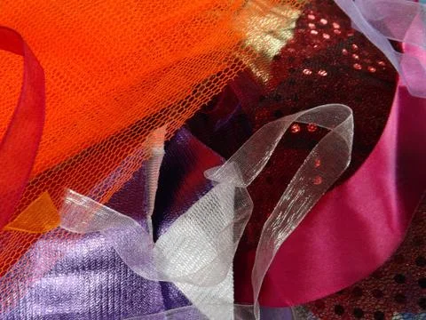 Different coloured textures and types of textiles 80s retro Stock Photos