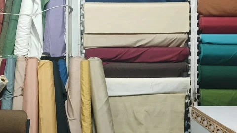 Different colours simple curtains clothe rolls Stock-Footage 231330392